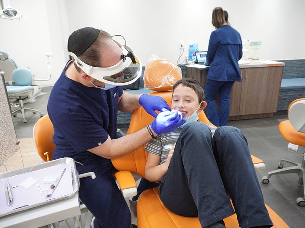 Child receiving dental care in a clinic.